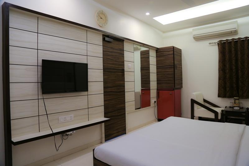 Golden Plaza Hotel Ahmedabad Værelse billede