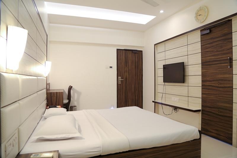 Golden Plaza Hotel Ahmedabad Værelse billede